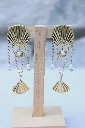 Les-moires-du-temps-boucle-d'oreille-coquillage-perle-non-porté-phonicé.webp